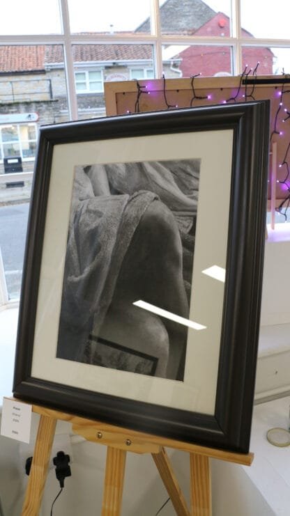 Knees under a soft blanket Charcoal drawing by Bob Iles